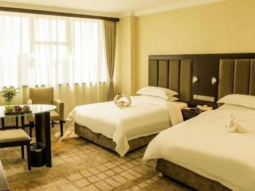 Bed in Jincheng Pacific Hotel