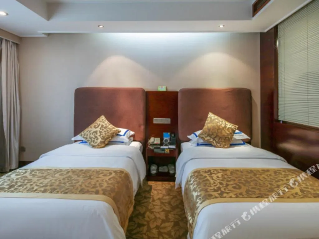 Bed in Jincheng Pacific Hotel