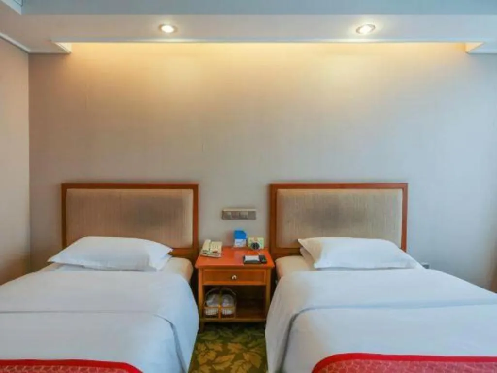 Bed in Jincheng Pacific Hotel