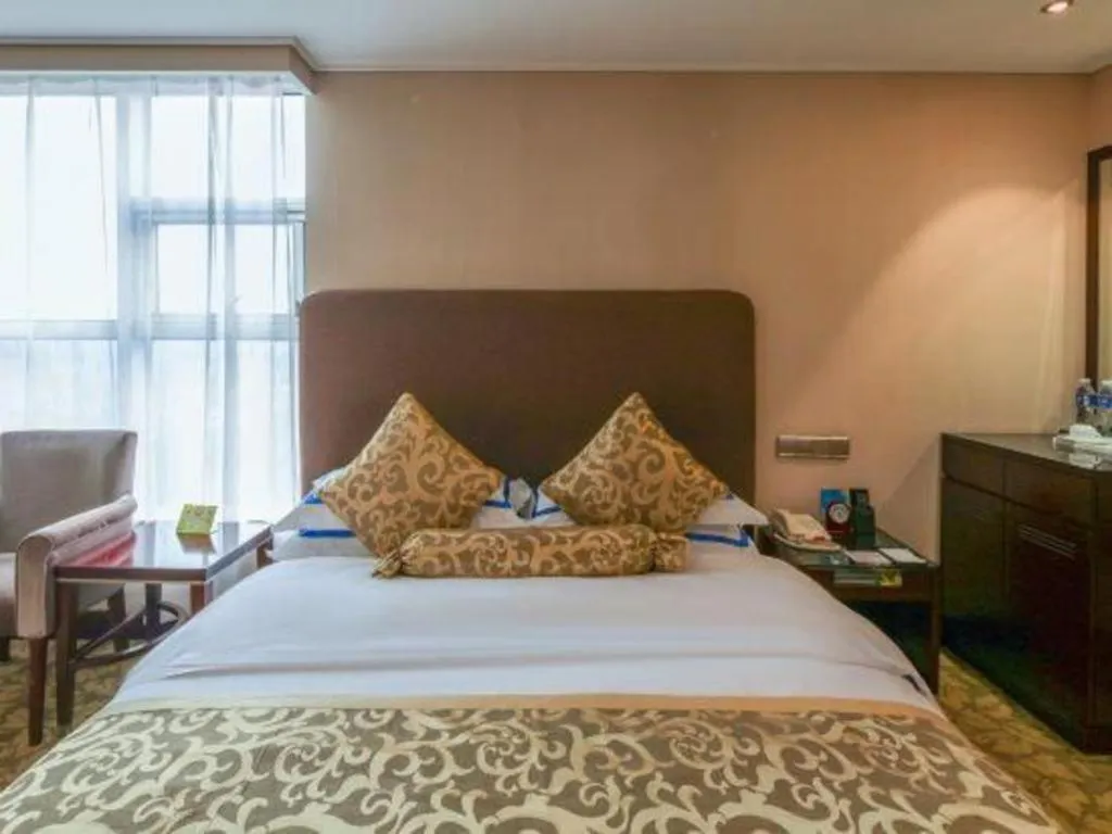 Bed in Jincheng Pacific Hotel