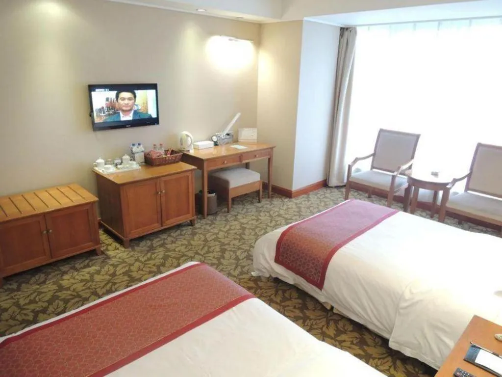 Bed in Jincheng Pacific Hotel