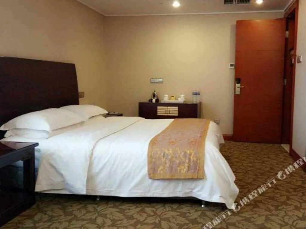 Bed in Jincheng Pacific Hotel