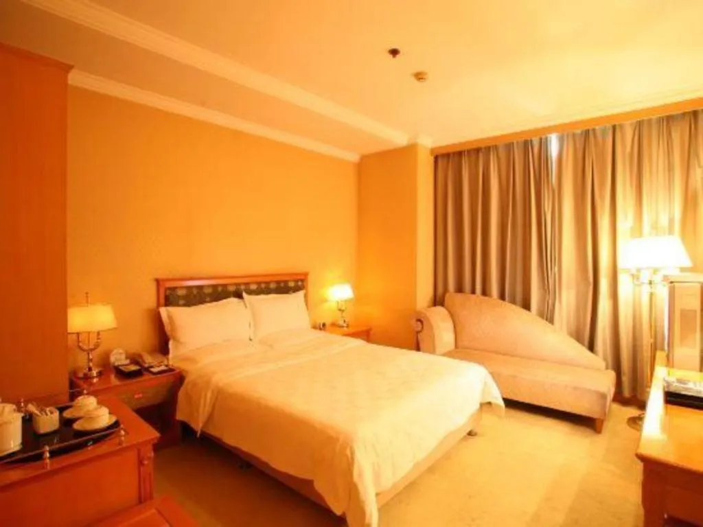Bed in Jincheng Pacific Hotel