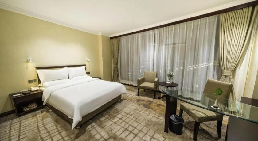 Bed in Jincheng Pacific Hotel