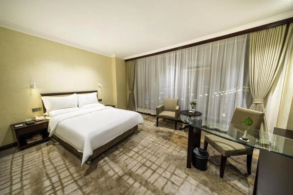 Bed in Jincheng Pacific Hotel