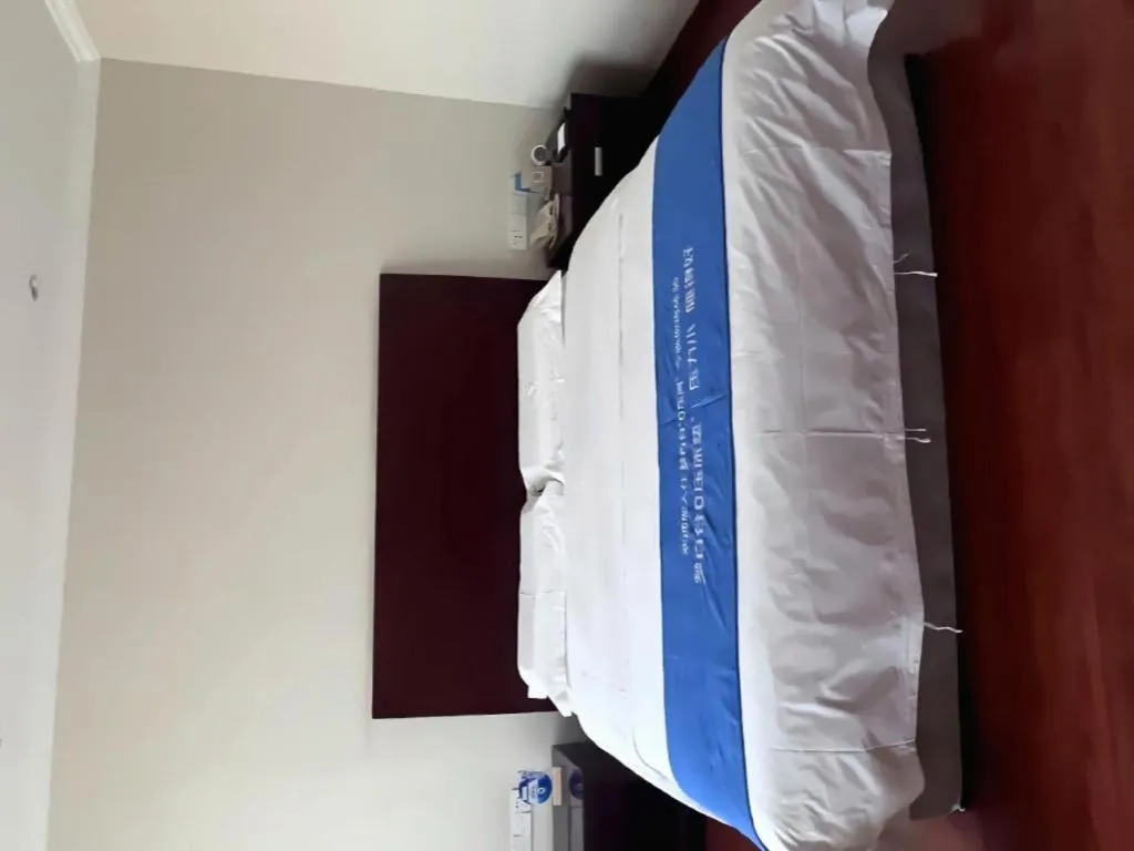 Bed in Jincheng Pacific Hotel