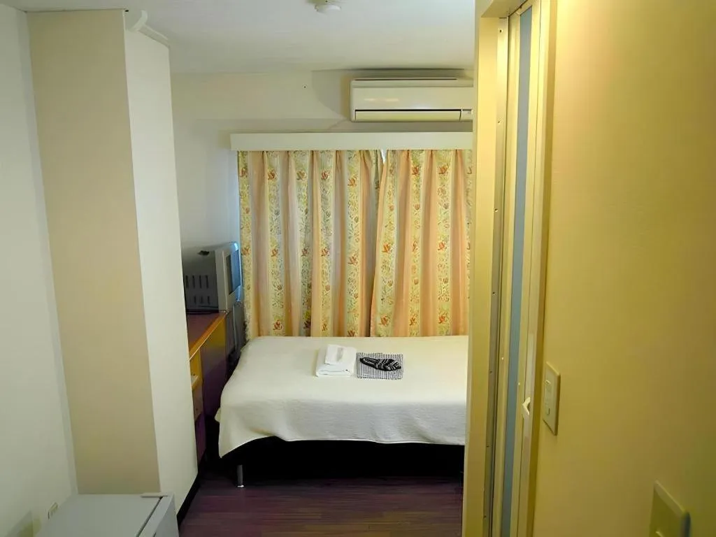 Bed in Eishinkan Hotel