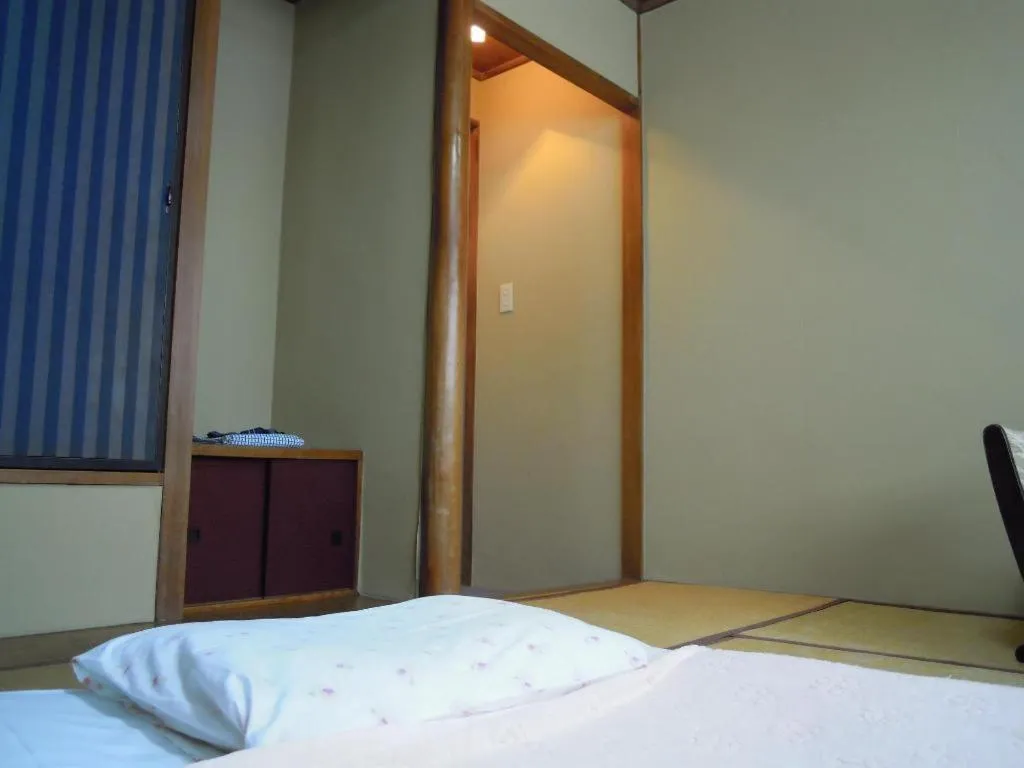 Bed in Eishinkan Hotel