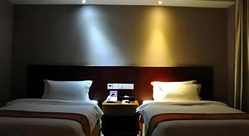 Bed in Guangna Hotel