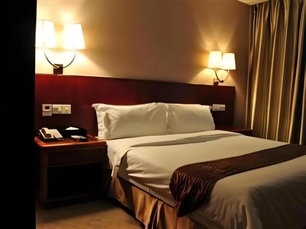 Bed in Guangna Hotel