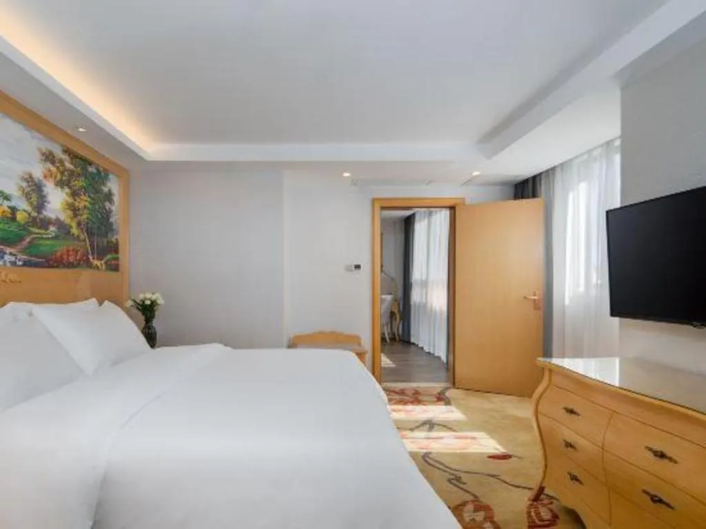 Bed in Guangna Hotel