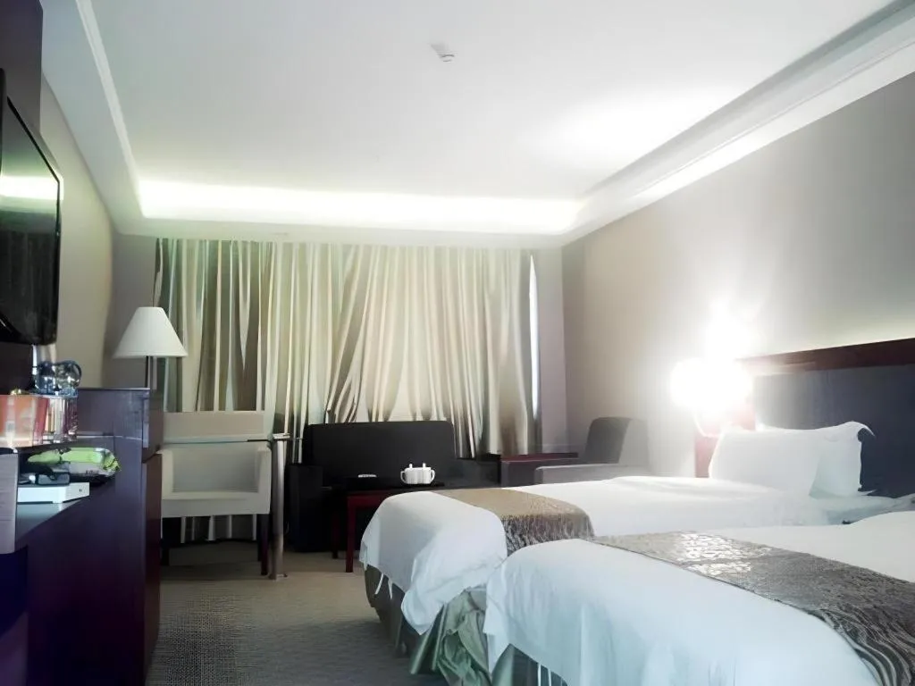 Bed in Guangna Hotel