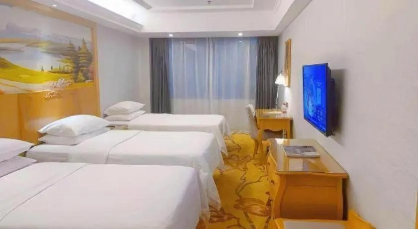 Bed in Guangna Hotel