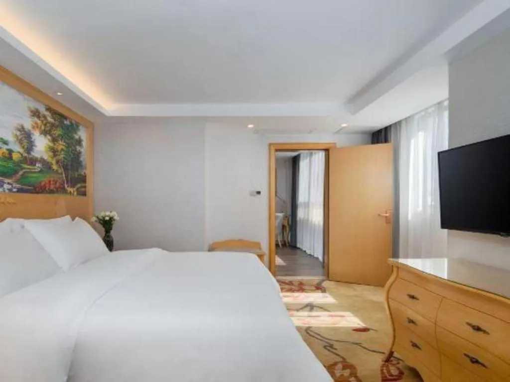 Bed in Guangna Hotel