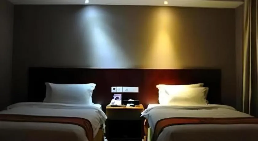 Bed in Guangna Hotel