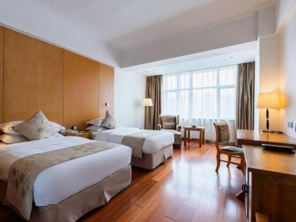 Bed in Qingdao Haidu Hotel