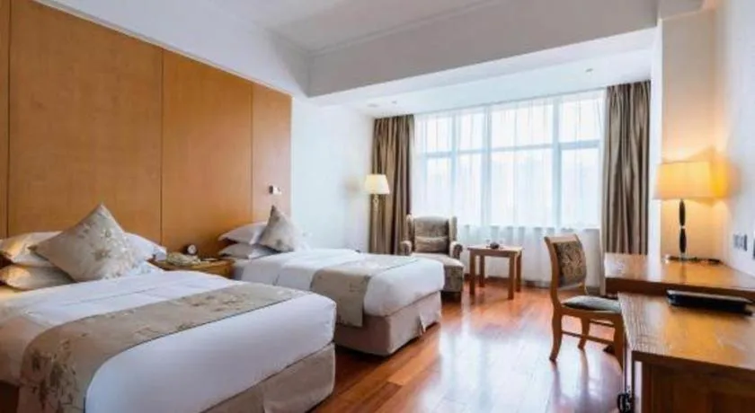 Bed in Qingdao Haidu Hotel