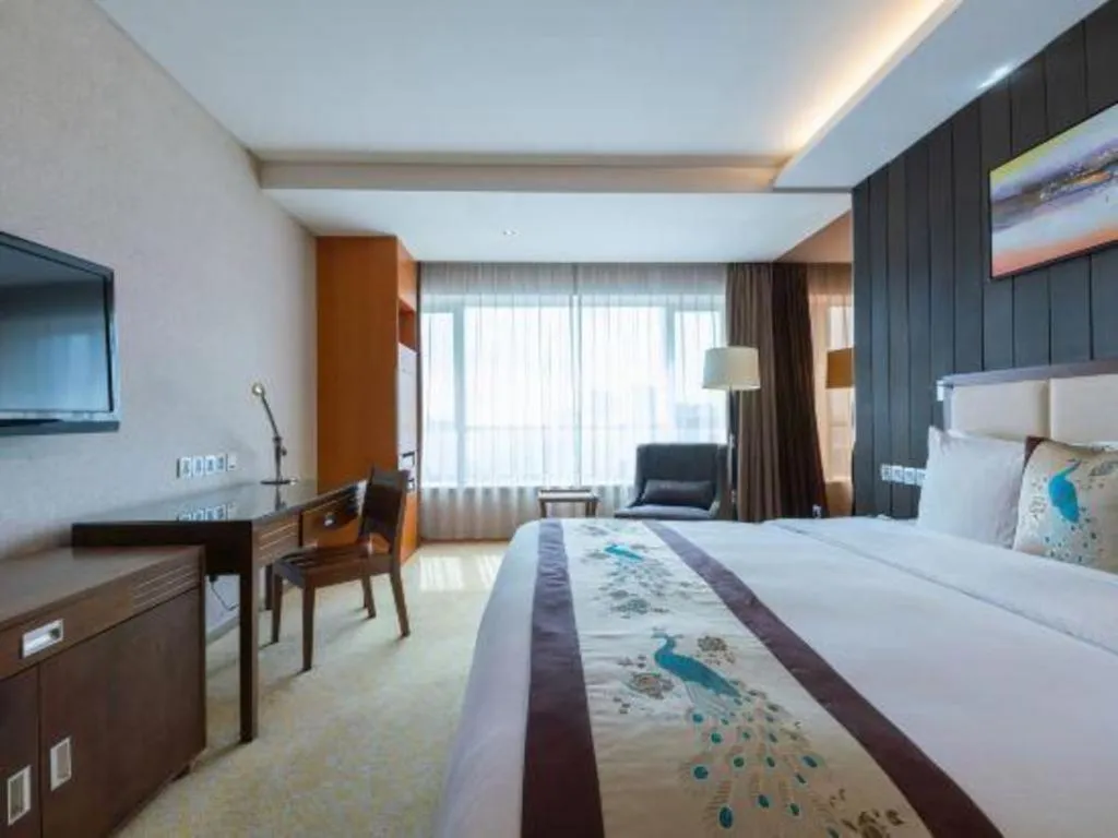 Bed in Qingdao Haidu Hotel