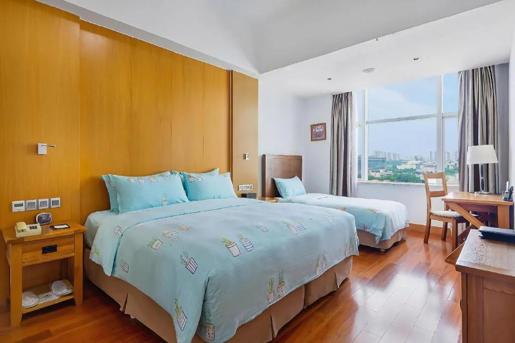 Bed in Qingdao Haidu Hotel