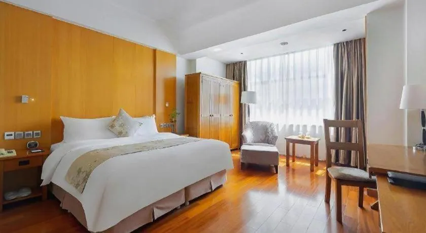 Bed in Qingdao Haidu Hotel