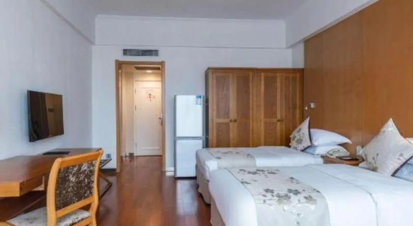 Bed in Qingdao Haidu Hotel