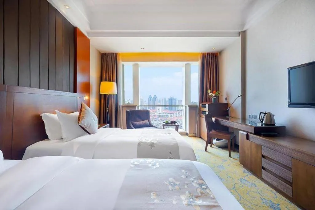 Bed in Qingdao Haidu Hotel