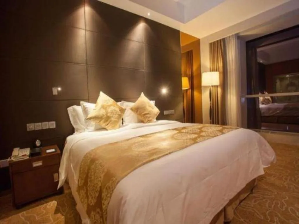 Bed in Qingdao Haidu Hotel