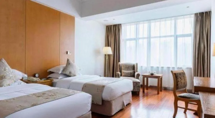 Bed in Qingdao Haidu Hotel