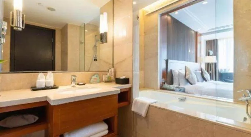 Bed in Qingdao Haidu Hotel