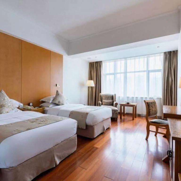 Bed in Qingdao Haidu Hotel