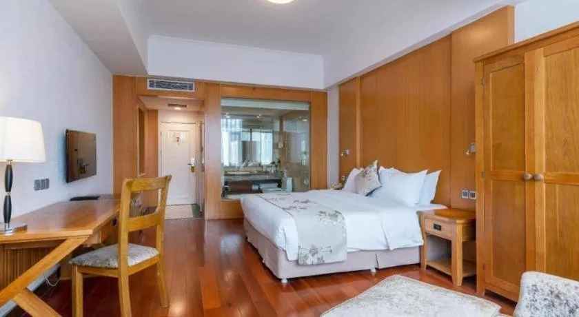 Bed in Qingdao Haidu Hotel