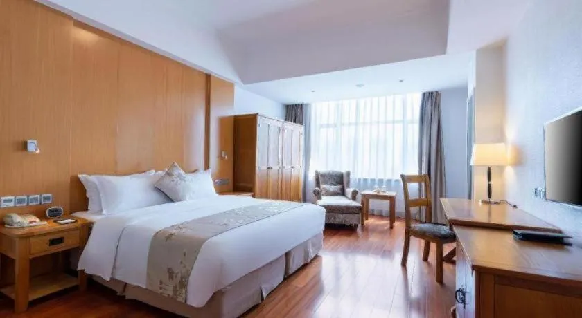 Bed in Qingdao Haidu Hotel