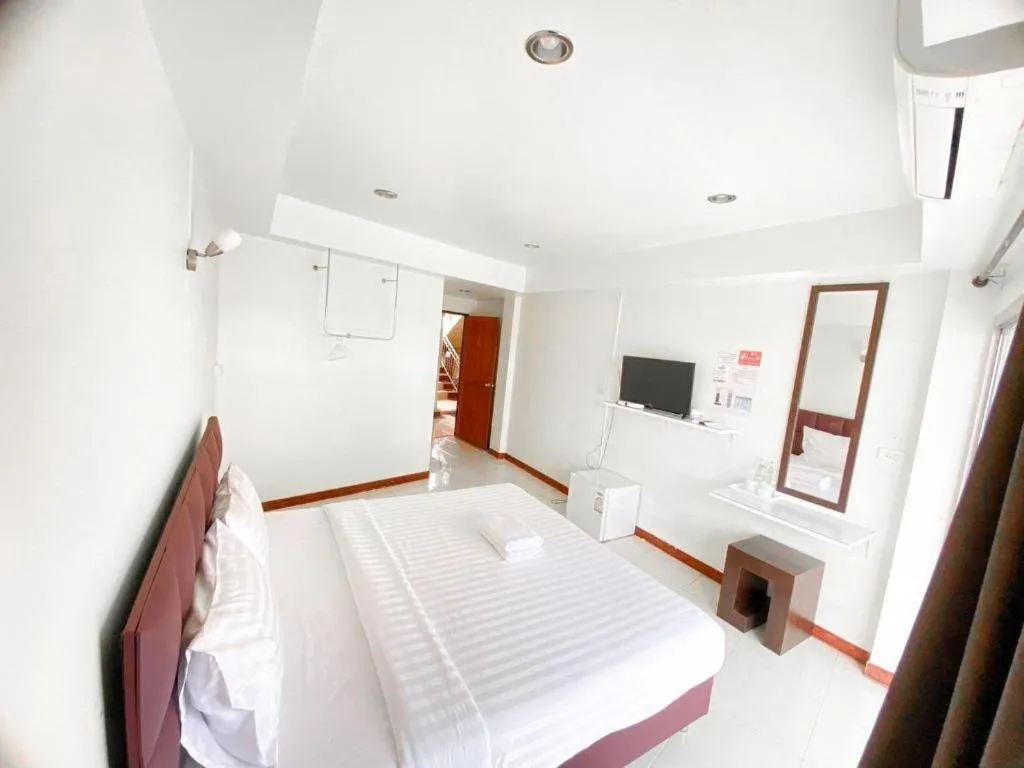 Bed in Baan Rim Khong Hotel