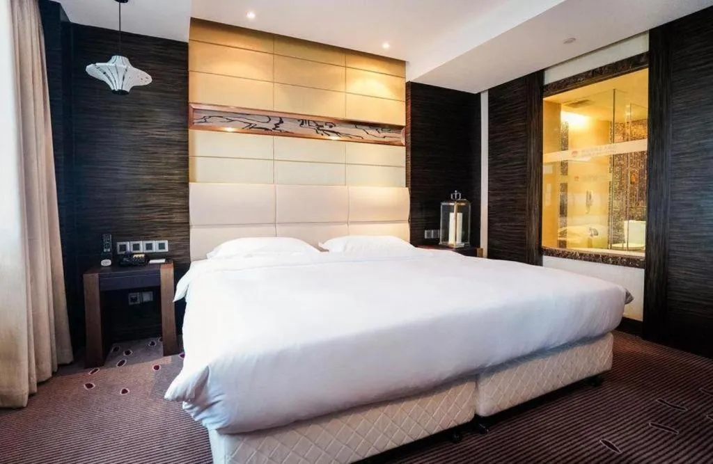 Bed in Grand Metropark Hotel Qingdao