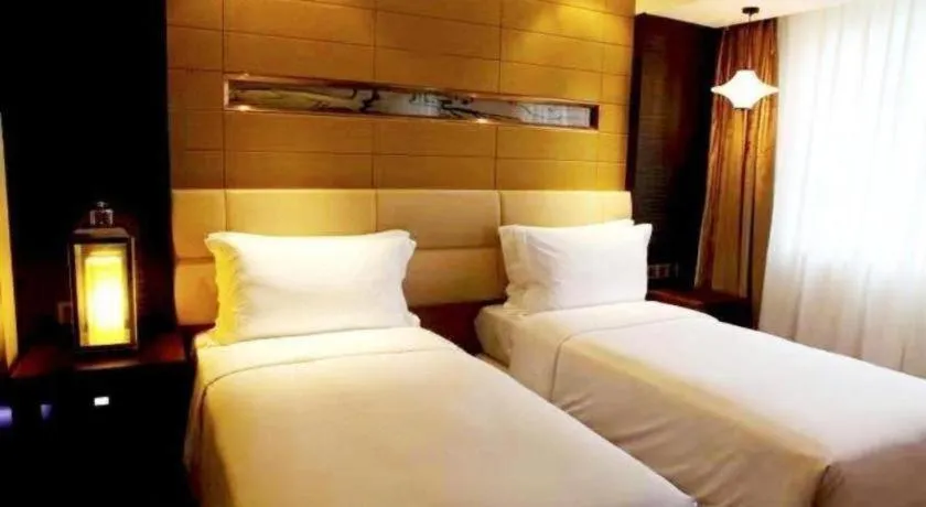 Bed in Grand Metropark Hotel Qingdao