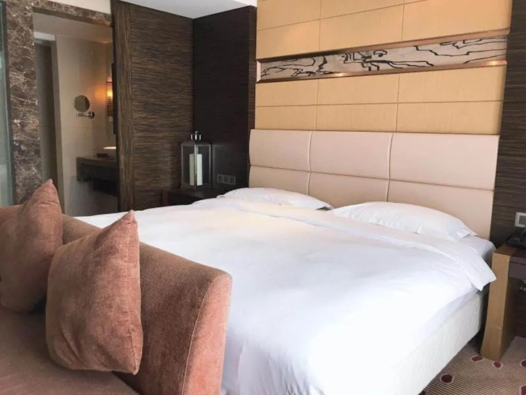 Bed in Grand Metropark Hotel Qingdao