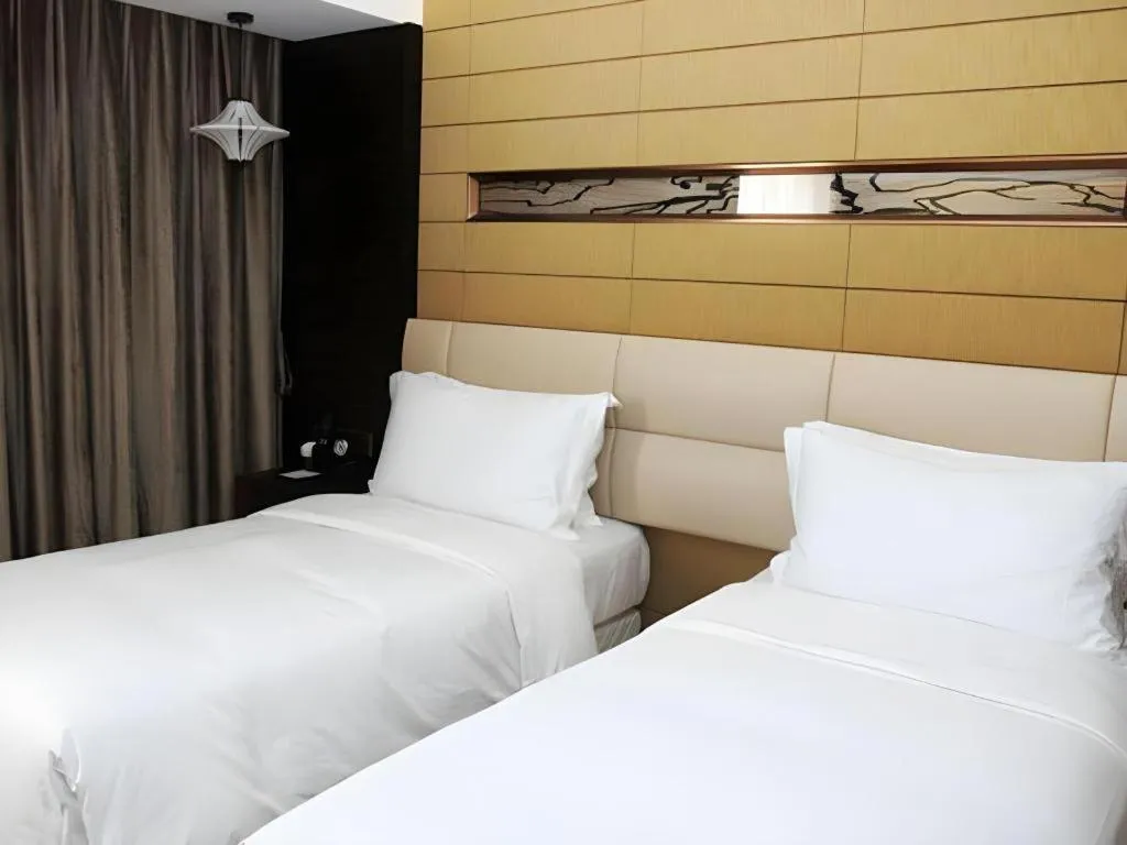 Bed in Grand Metropark Hotel Qingdao