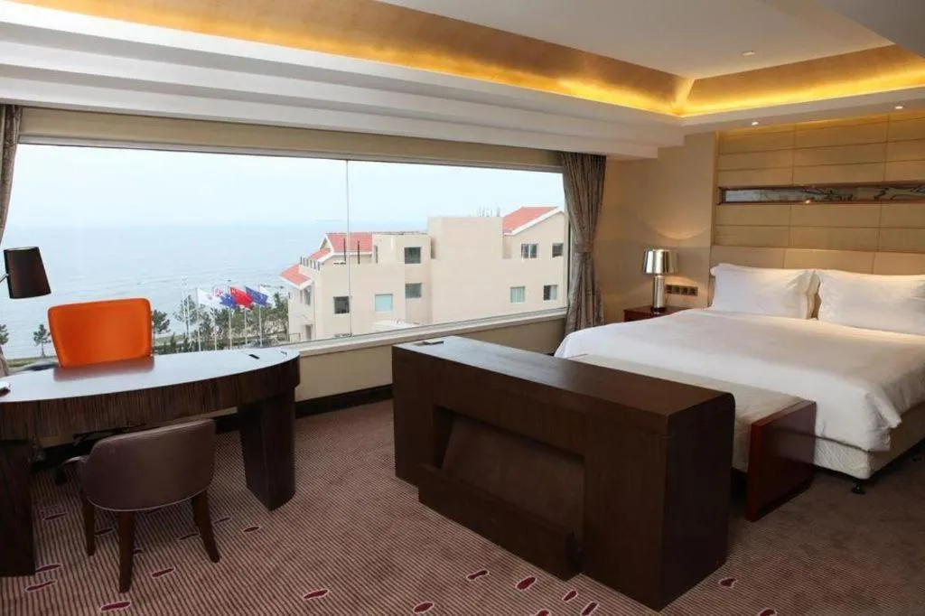 Bed in Grand Metropark Hotel Qingdao