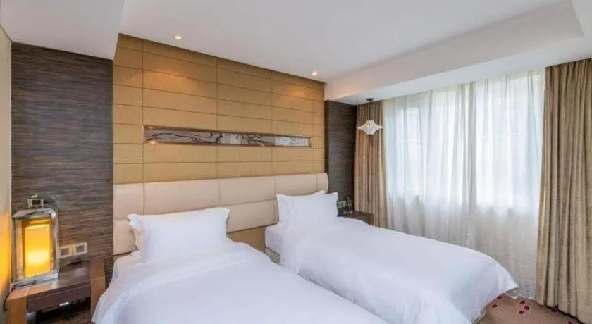 Bed in Grand Metropark Hotel Qingdao
