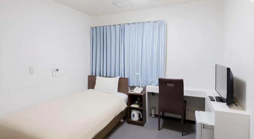 Bed in Ikebukuro Royal Hotel Higashiguchi