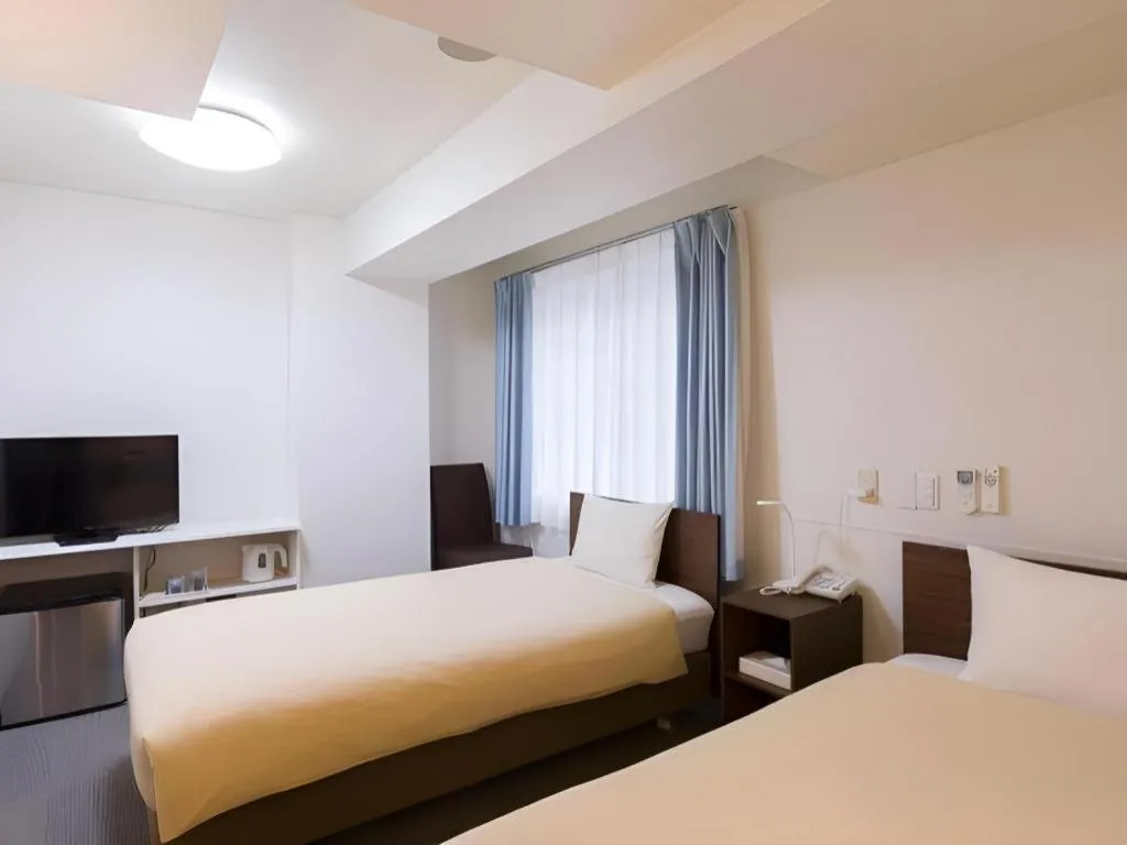 Bed in Ikebukuro Royal Hotel Higashiguchi