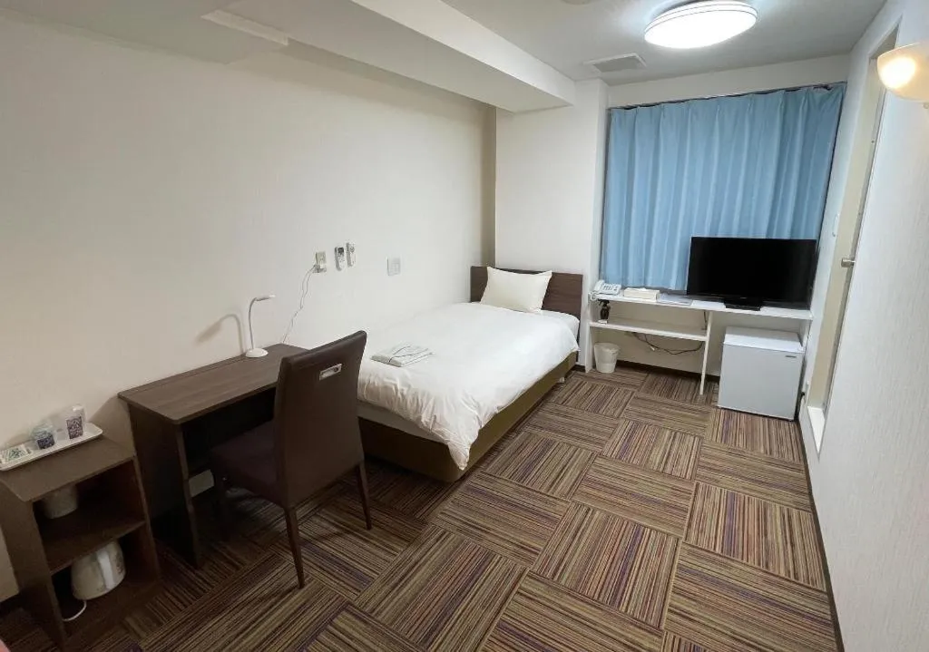 Bed in Ikebukuro Royal Hotel Higashiguchi