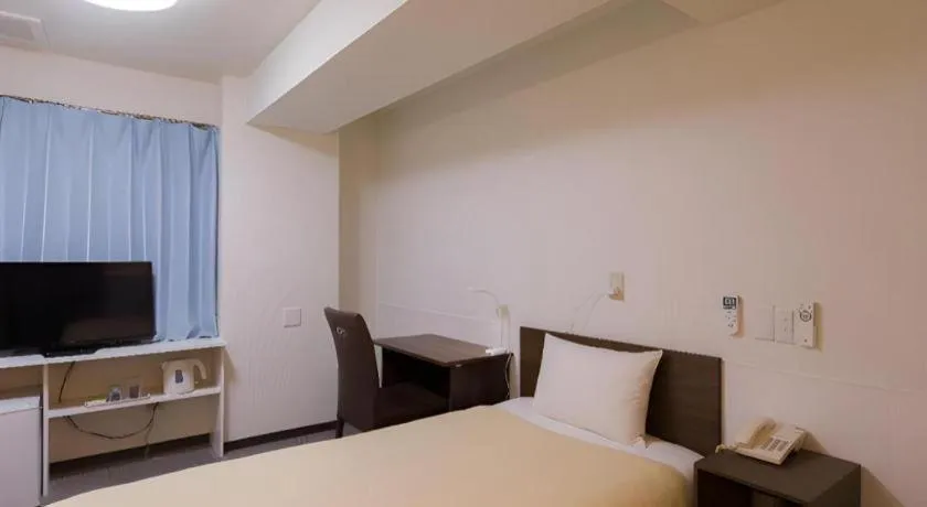 Bed in Ikebukuro Royal Hotel Higashiguchi