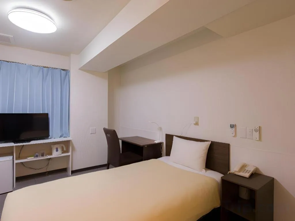 Bed in Ikebukuro Royal Hotel Higashiguchi