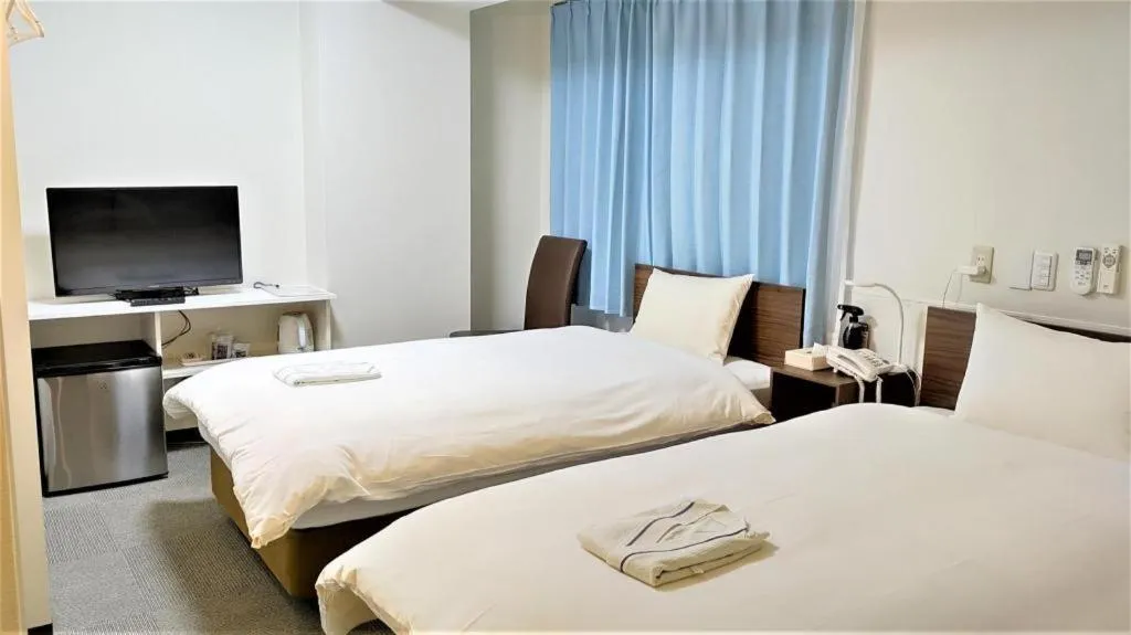 Bed in Ikebukuro Royal Hotel Higashiguchi