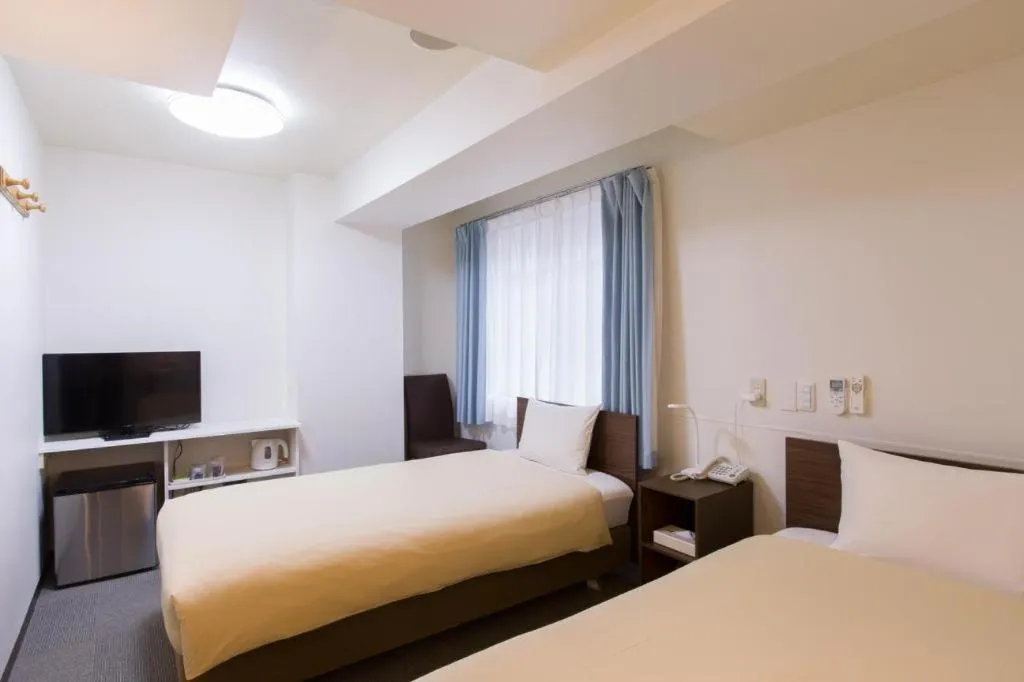 Bed in Ikebukuro Royal Hotel Higashiguchi