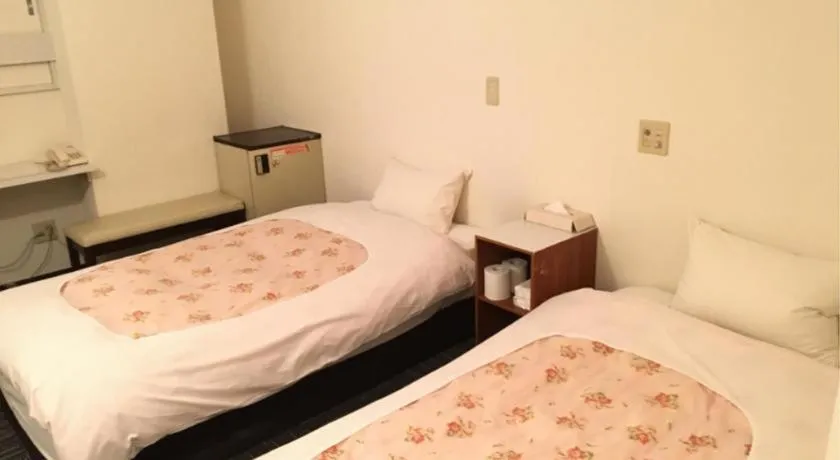 Bed in Ikebukuro Royal Hotel Higashiguchi