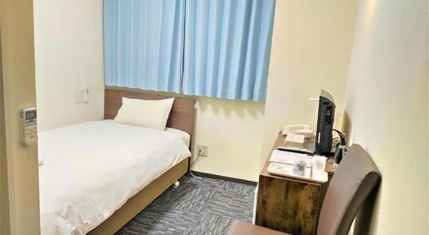 Bed in Ikebukuro Royal Hotel Higashiguchi