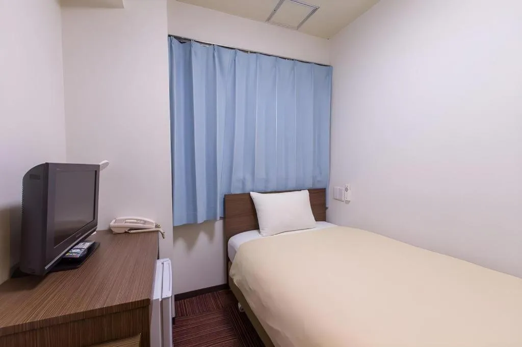 Bed in Ikebukuro Royal Hotel Higashiguchi