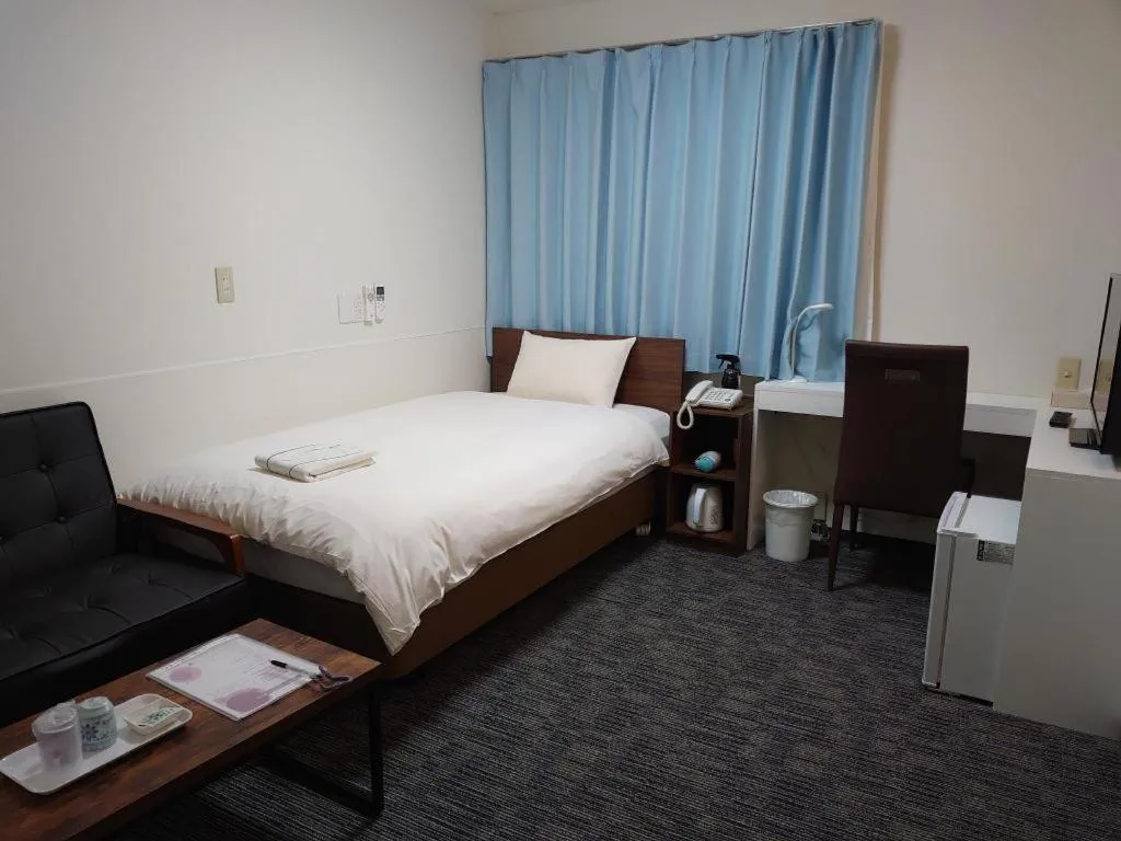 Bed in Ikebukuro Royal Hotel Higashiguchi